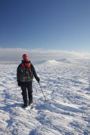 09-9899 Hill Walker on the Summit Plateau of Cross Fell and the View Towards Great Dun Fell. North Pennines